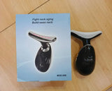 EMS Face Massager in use